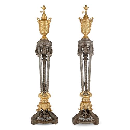 Pair of silvered and gilt cast iron antique floor lamps