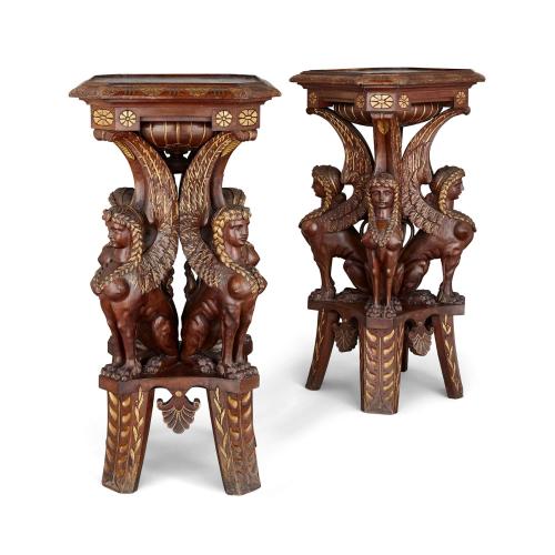 Pair of carved walnut and parcel gilt antique stands