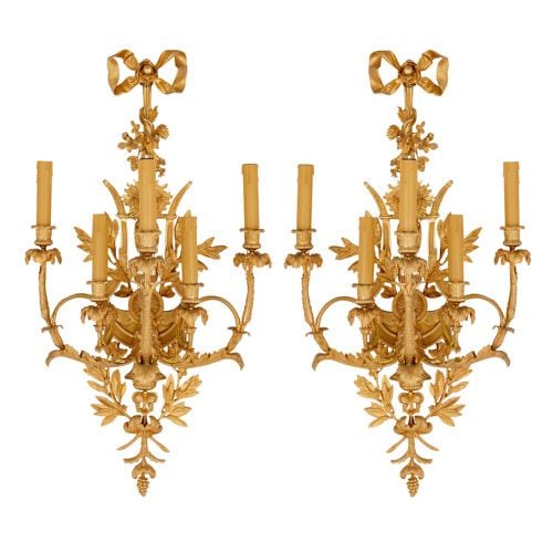 Pair of five-light ormolu wall lights after Feuchère