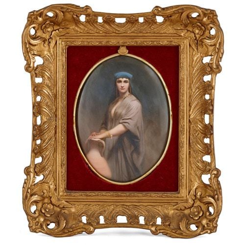 Oval KPM porcelain plaque depicting a lady with a pitcher