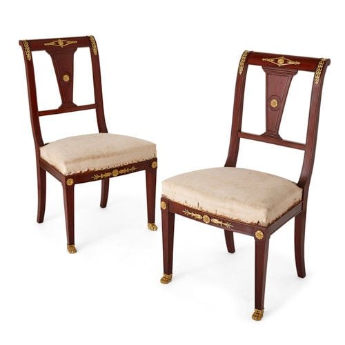 Pair of Empire style mahogany and ormolu side chairs