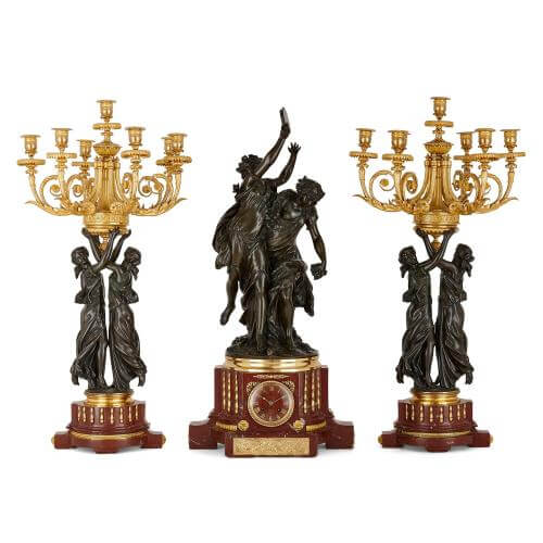 Marble and bronze antique three-piece clock set by Graux