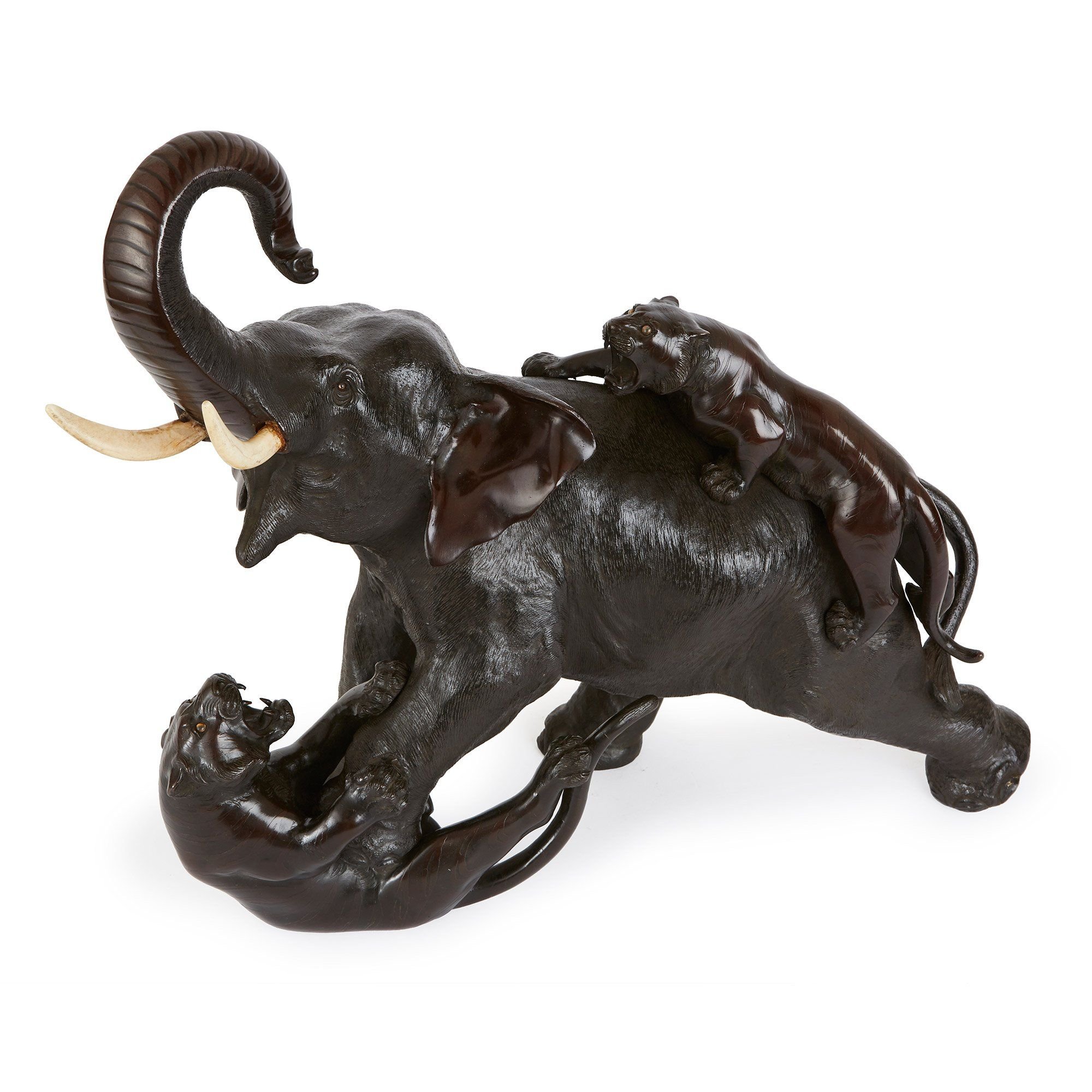 Meiji period patinated bronze group of an elephant and tigers Mayfair