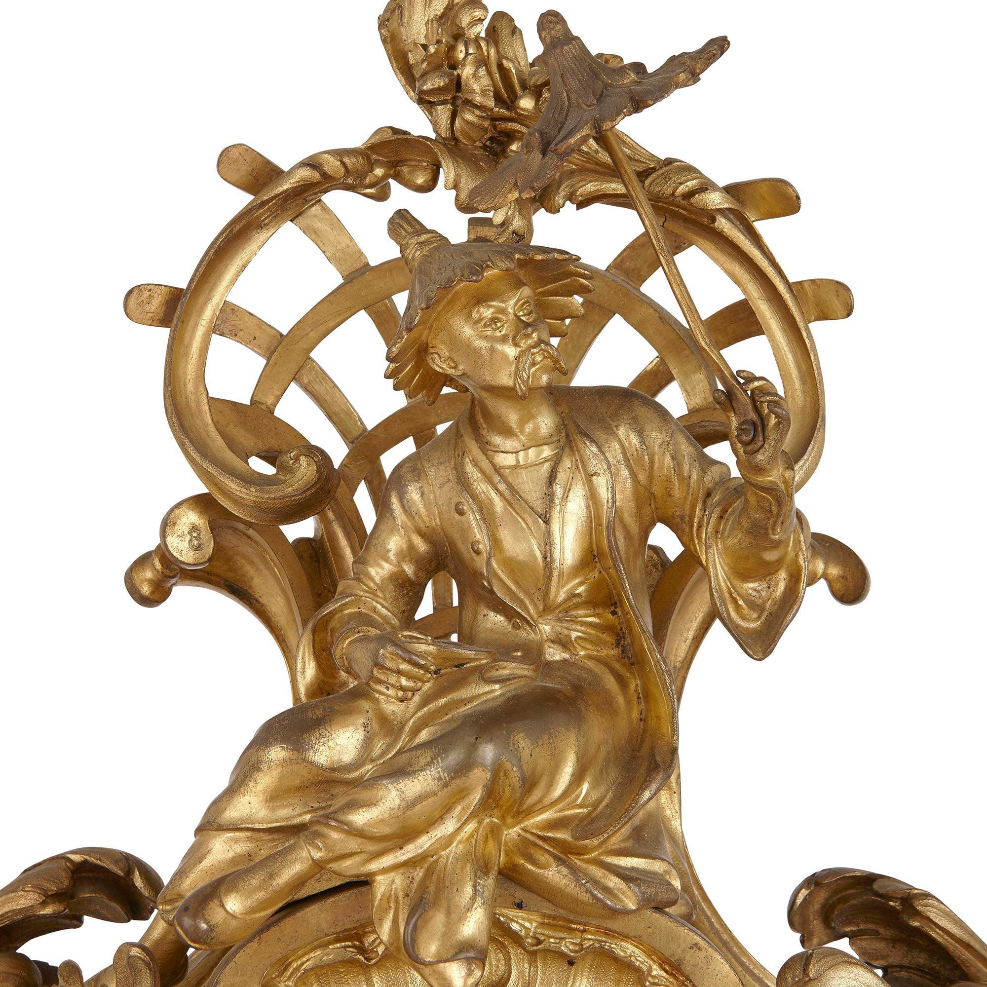 Louis XV period Chinoiserie style gilt bronze mantel clock