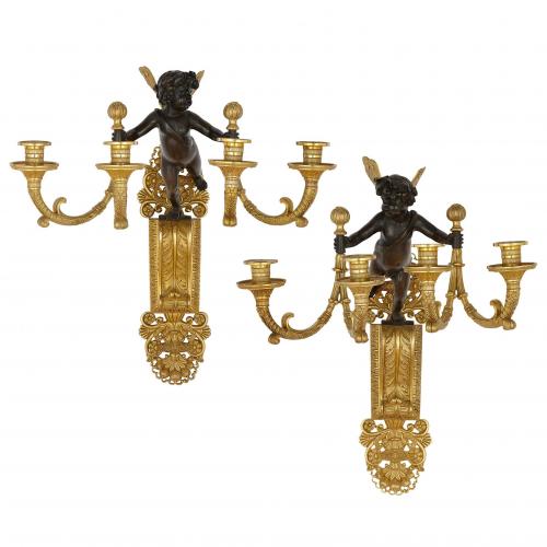 Pair of gilt and patinated bronze Restauration wall lights