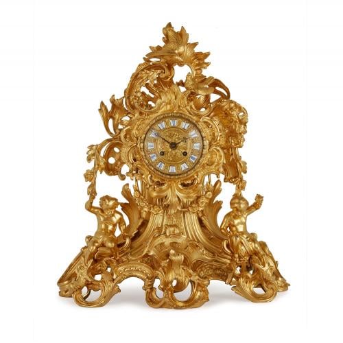 Large French Louis XV style antique ormolu mantel clock