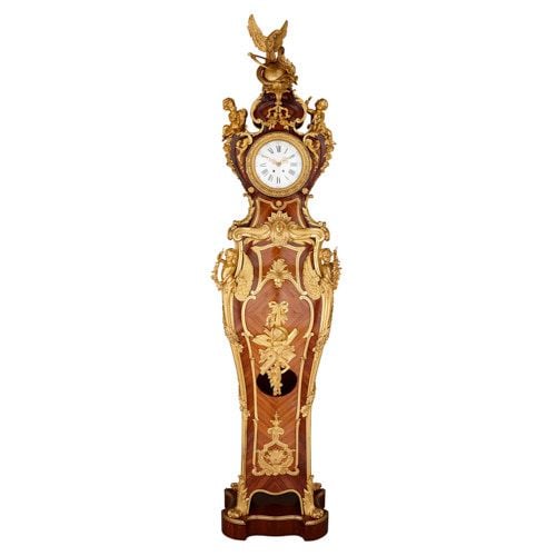 Régence style ormolu mounted kingwood longcase clock by Kahn