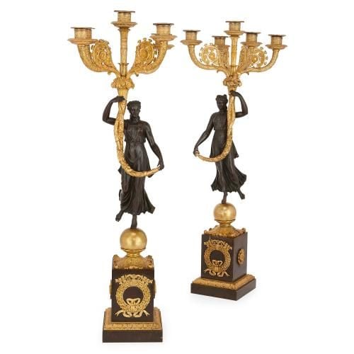 Pair of Empire period gilt and patinated bronze candelabra