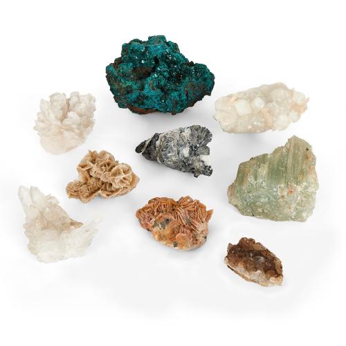 Collection of crystal specimens including emerald and quartz