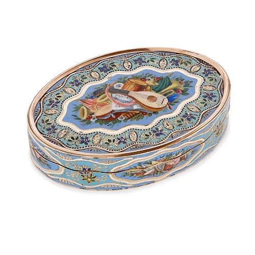 Swiss gold and enamel snuff box with music themed decoration