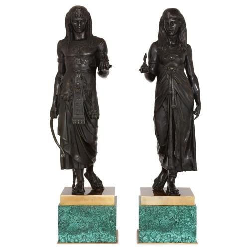 Pair of Egyptian Revival bronze figures on malachite bases
