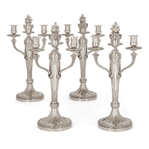 Four French Neoclassical style silver candelabra by Aucoc