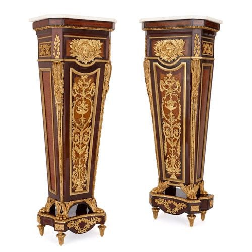 Two ormolu and marble mounted pedestals after Riesener