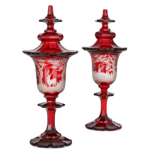 Pair of large Bohemian etched ruby glass goblets and covers