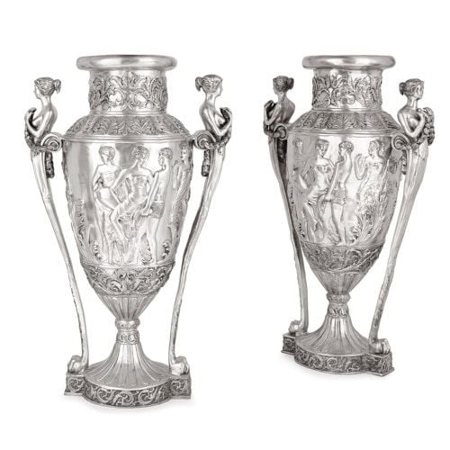 Pair of large French Neoclassical style silvered bronze vases