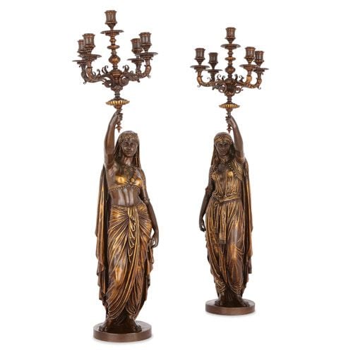 Pair of gilt and patinated bronze candelabra by Barbedienne