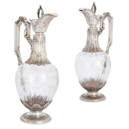 Pair of antique French silver and glass claret jugs by Gross