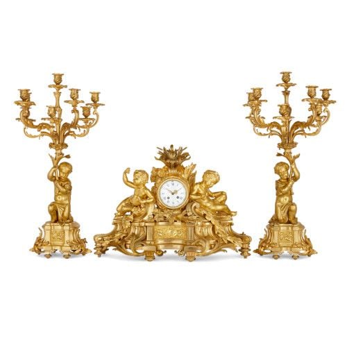 Rococo style ormolu clock set by Picard and Raingo Frères