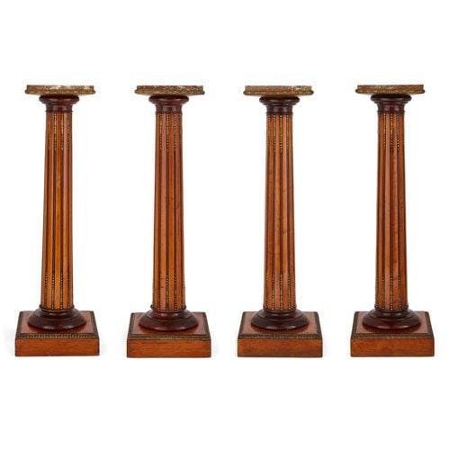 Set of four satinwood, marble, and ormolu pedestals
