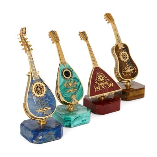 Precious Instruments Set of semi-precious stone and silver-gilt miniature instruments ...