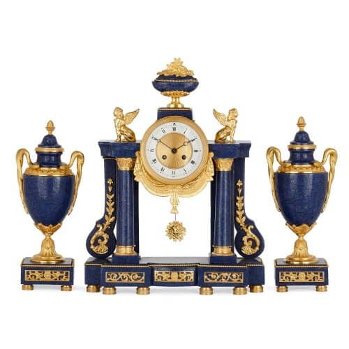 Gilt bronze and lapis lazuli three piece clock garniture