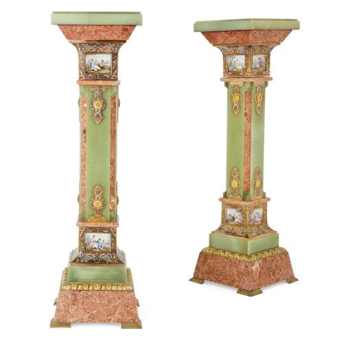 Pair of porcelain and champlevé enamel mounted onyx pedestals