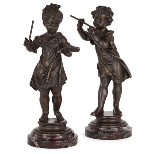 Pair of sculpted bronze figures by Rousseau