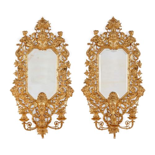 Pair of Renaissance style ormolu mirrors with candelabra