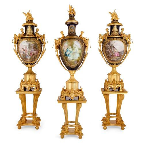 Set of Sèvres style ormolu mounted porcelain vases with pedestals