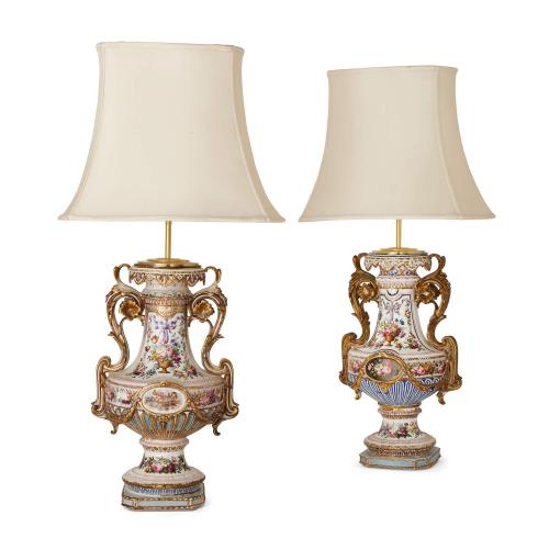 Pair of French parcel gilt floral porcelain lamps