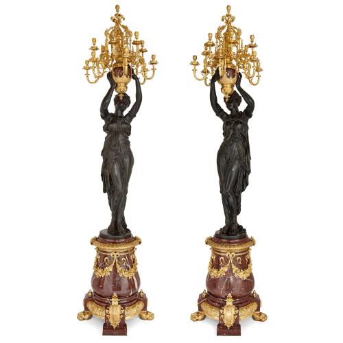 Pair of monumental 13-light bronze candelabra after Carrier-Belleuse