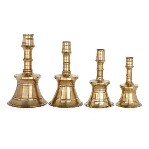 Graduated set of four Ottoman brass candlesticks