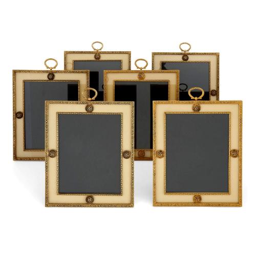 Set of six gilt metal photograph frames by Puiforcat