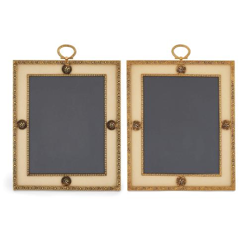 Pair of gilt-metal rectangular photograph frames by Puiforcat