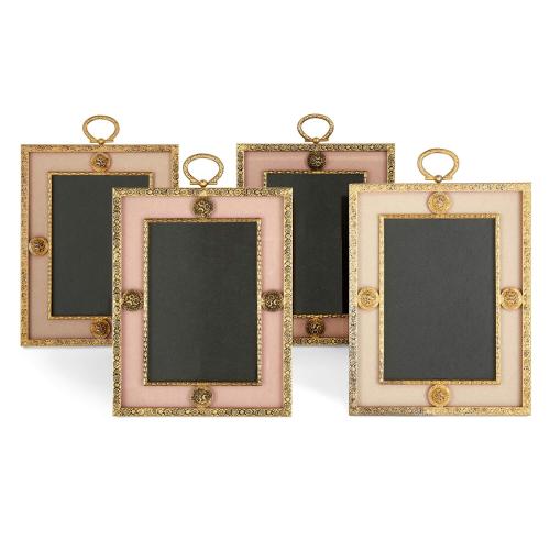 Set of four gilt-metal rectangular photo frames by Puiforcat