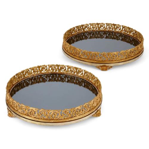 Pair of Napoleon III circular ormolu surtouts de table