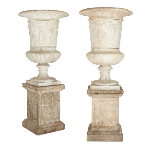 Pair of large continental carved marble garden urns of campana form