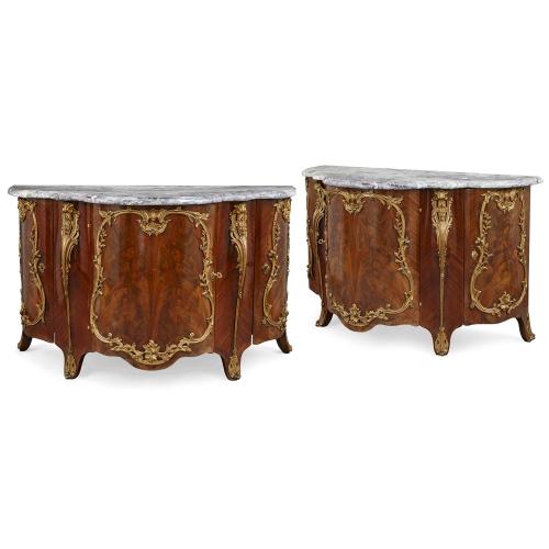 A pair of Louis XV style ormolu-mounted mahogany commodes