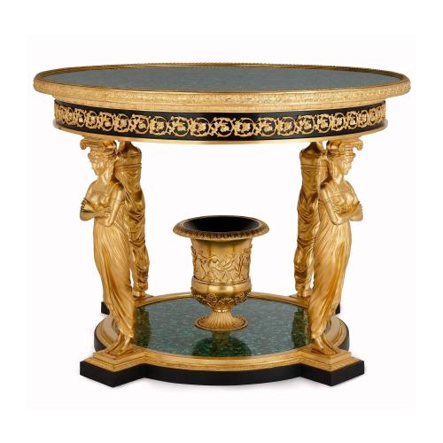 An ormolu and malachite Empire-style round caryatid centre table