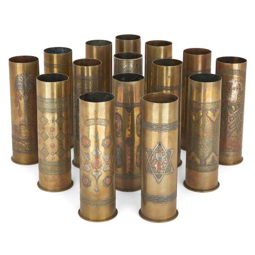 A set of 15 Bezalel Judaica decorated WWI brass shell cases