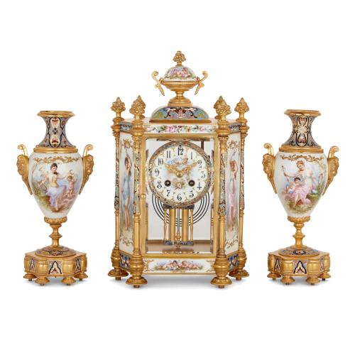 Porcelain, champlevé enamel and ormolu three piece clock set