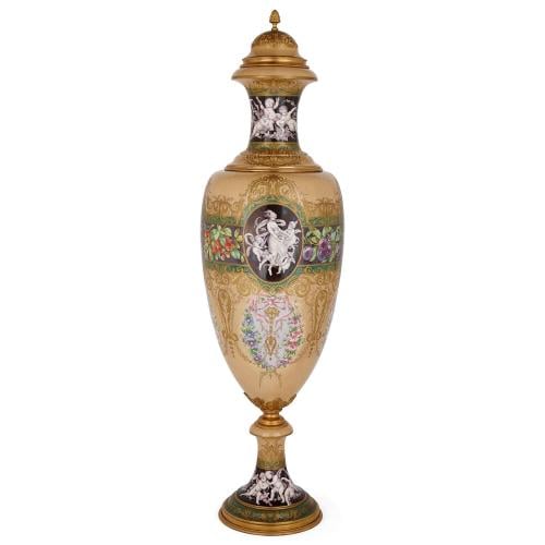 The Four Seasons: a monumental Sèvres style gilt porcelain vase