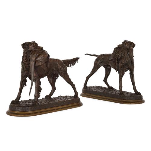 Pair of large patinated bronze models of dogs by Moigniez