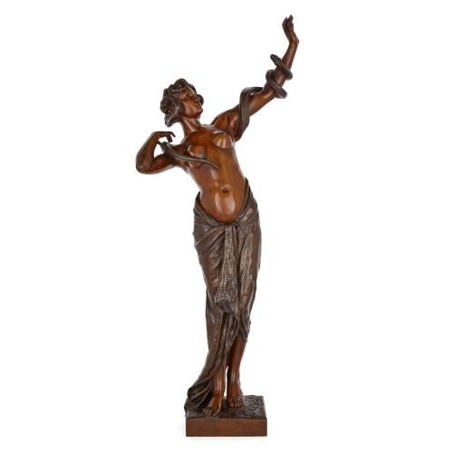 Large and rare bronze female figure with snake by F. Goldscheider