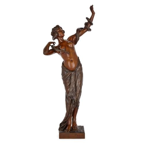 Large and rare bronze female figure with snake by F. Goldscheider