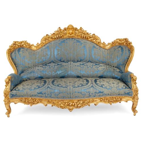 Large, very fine French Rococo revival style carved giltwood sofa