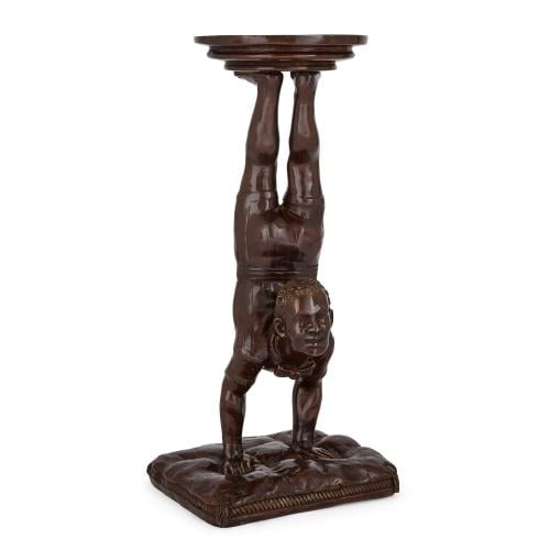 One bronze vide-poche sculptural table in the form of an acrobat