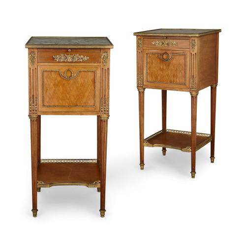 Pair of Louis XVI style mahogany and ormolu bedside cabinets