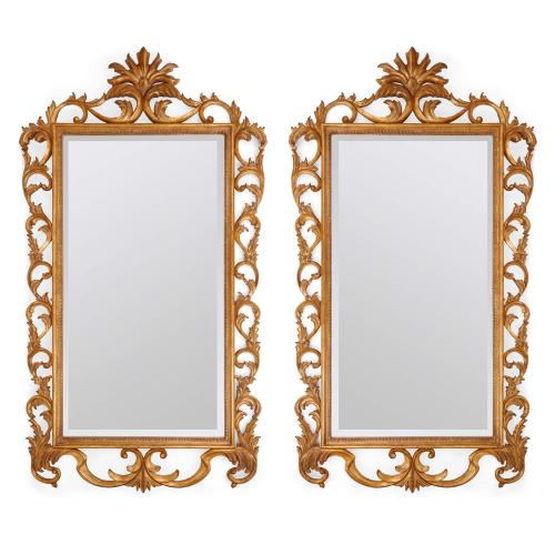 Pair of large French giltwood mirrors with scrolled acanthus borders