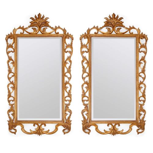 Pair of large French giltwood mirrors with scrolled acanthus borders